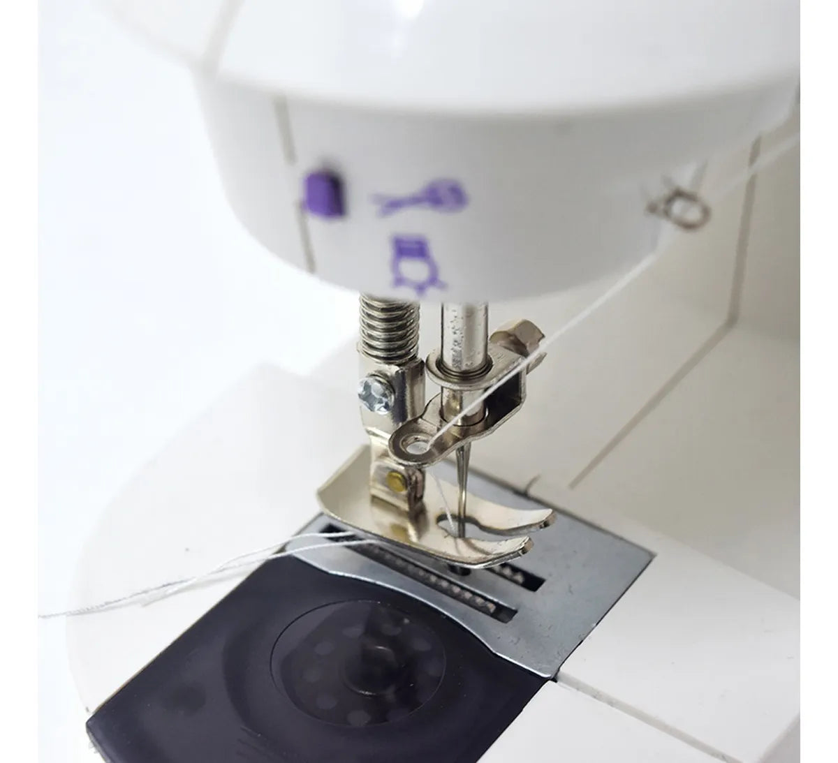 Mini máquina de coser™